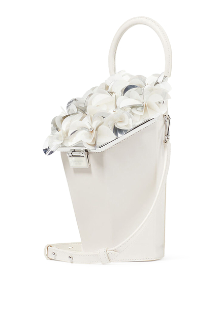 حقيبة ان بلوم بتصميم مزهرية بيد علوية وياقة زهور بارزة الملمس